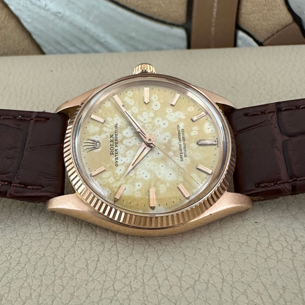 Rolex Oyster Perpetual Rose Gold 1005 14