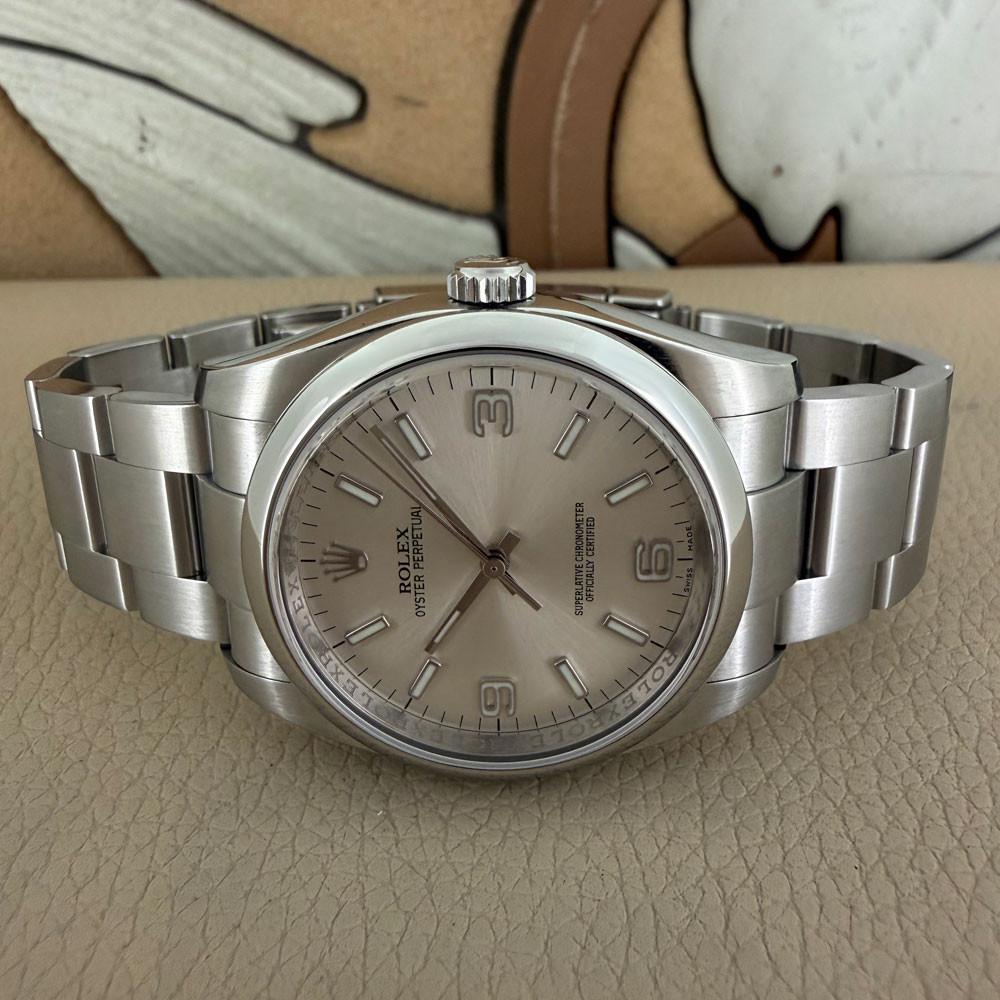 Rolex Oyster Perpetual 116000 7