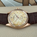 Rolex Oyster Perpetual Rose Gold 1005 14